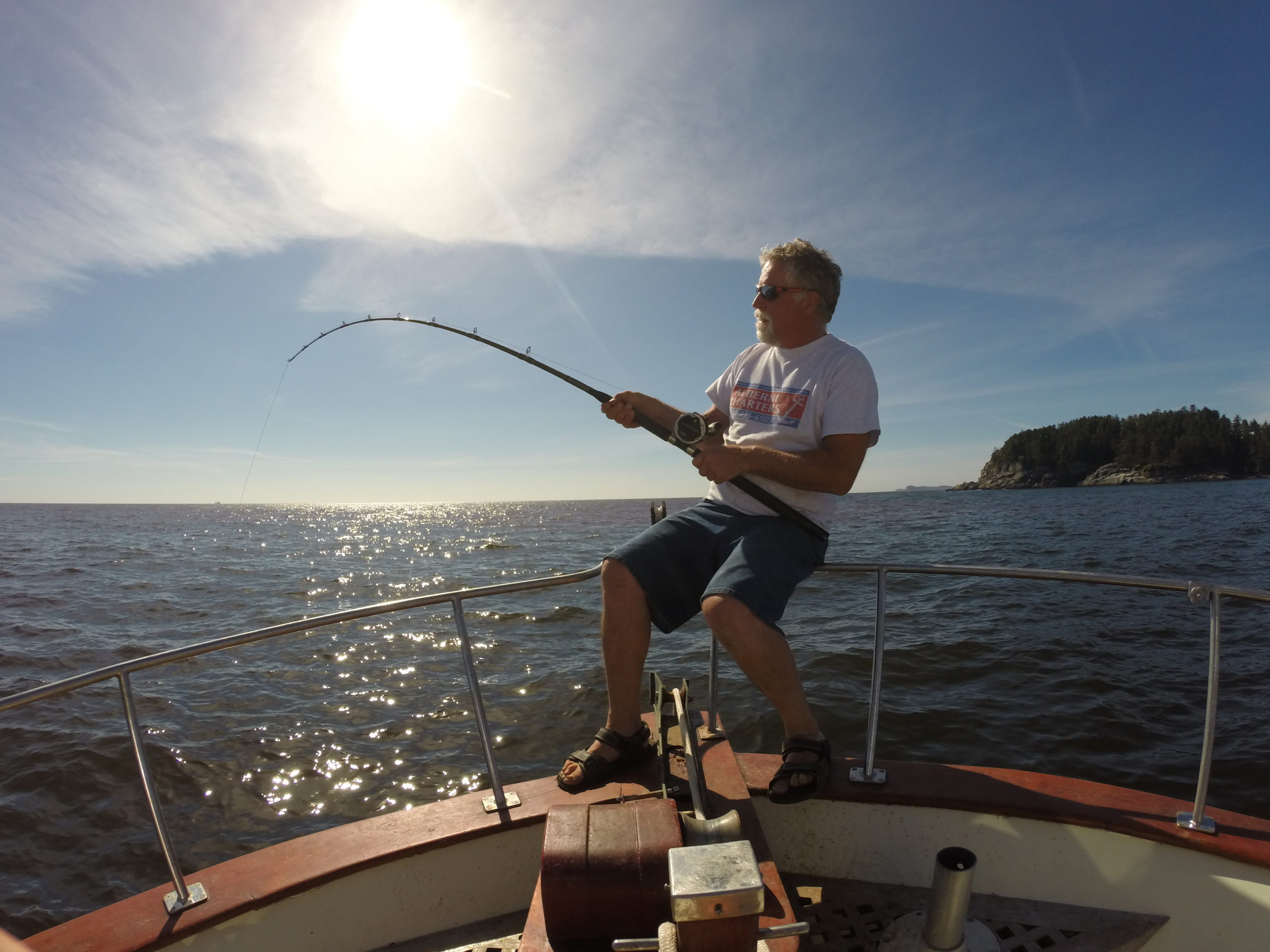 man fishing halibut