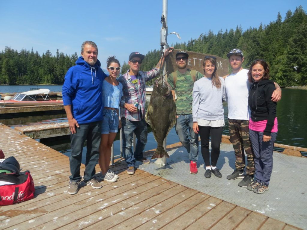 Family with 40 lb halibut