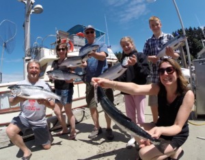 Family Fishing Charter with huge sockeye catch
